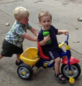 two boys on bike